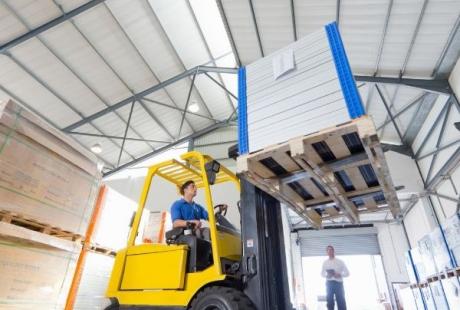 forklift driving with items helps up high