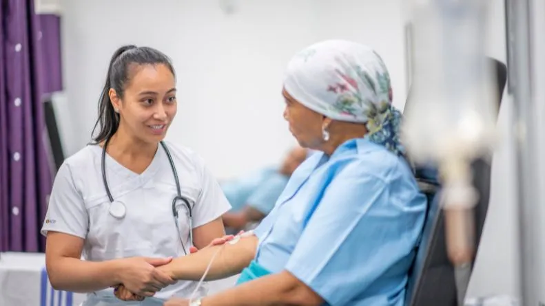 nurse with a patient in a hospital