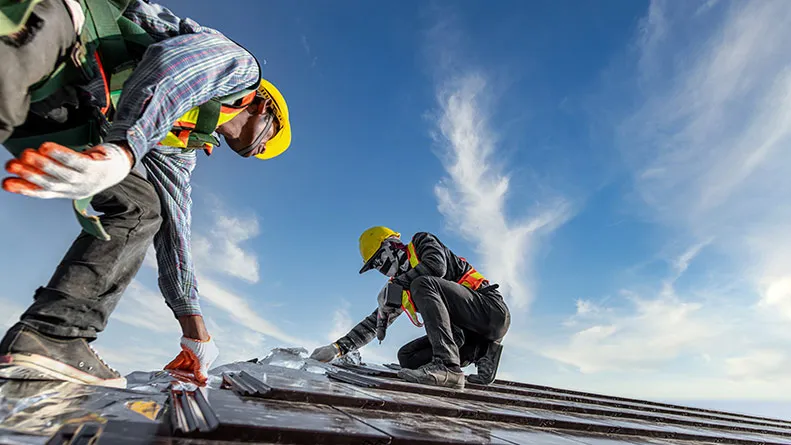 Construction workers on roof