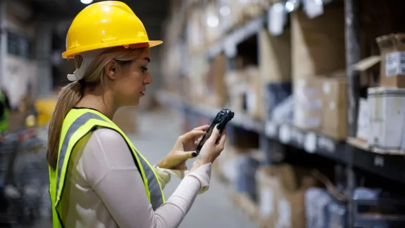 worker using rfid technology to track assets