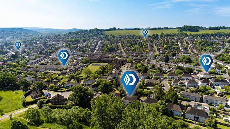RFiD Discovery icon pins on a aerial photograph of residential area in rural community
