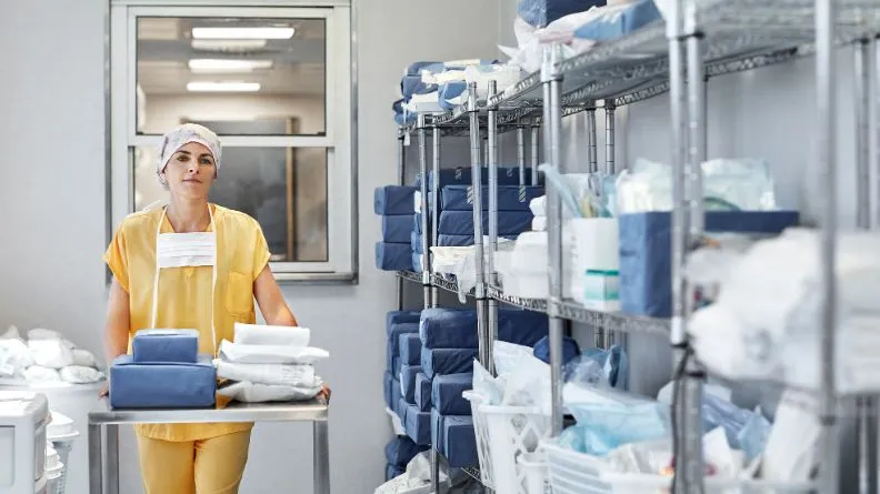 staff walking in hospital storage room